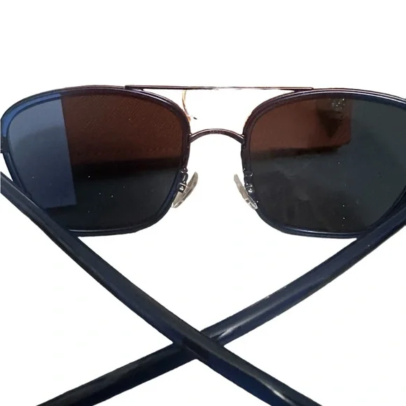 Tory Burch blue sunglasses with case, cloth & card Unisex